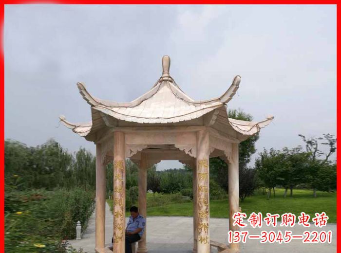 日照晚霞红六角石凉亭雕塑