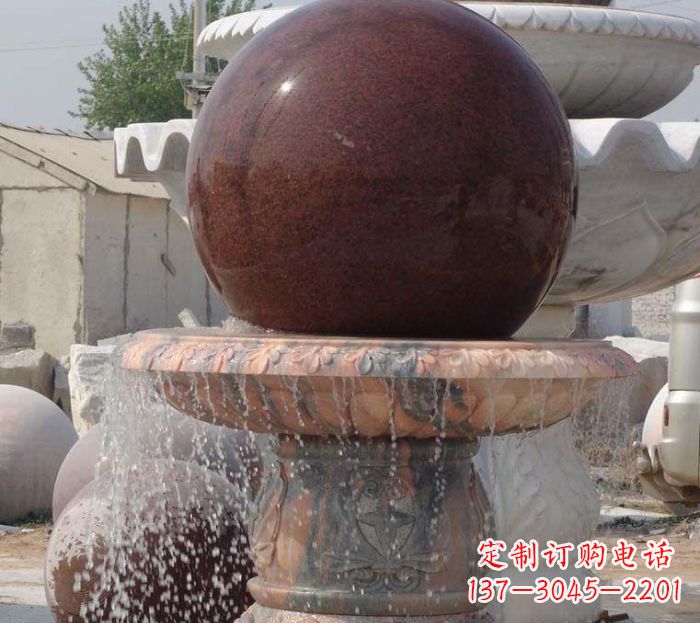日照石来运转小型风水球喷泉石雕