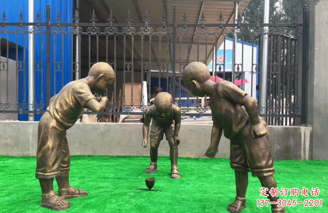 日照玩陀螺儿童铜雕塑