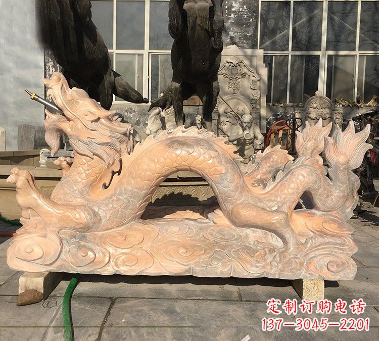 日照晚霞红石雕喷水龙